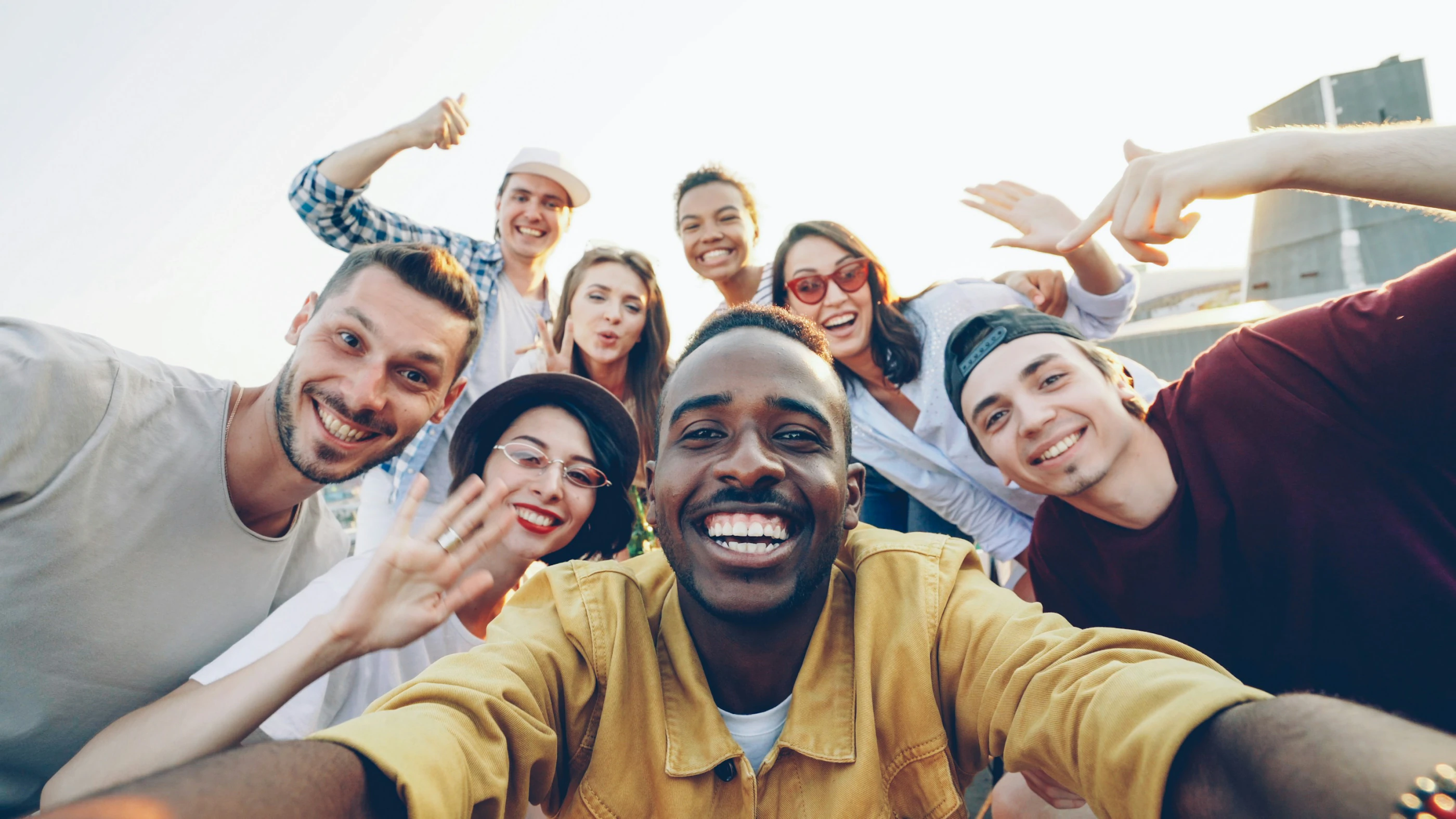 Group of friends taking a selfie outdoors
